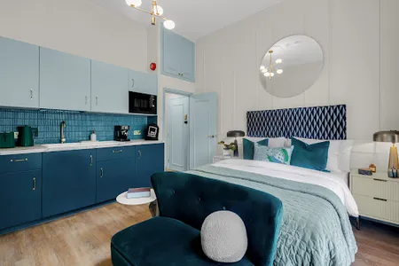 Open plan bedroom at Kensington Residences by MySquare