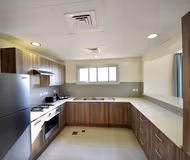 Full kitchen at Al Riffa Apartments