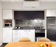 Fully equipped kitchen at Pakenham Street Serviced Apartments