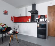 Full kitchen at Leicester Apartments