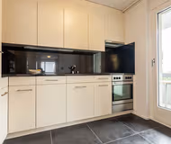 Fully equipped kitchen at Sihlfeldstrasse Serviced Apartment
