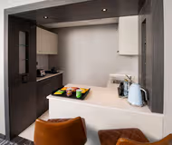 Kitchen at Deira Clocktower Apartment