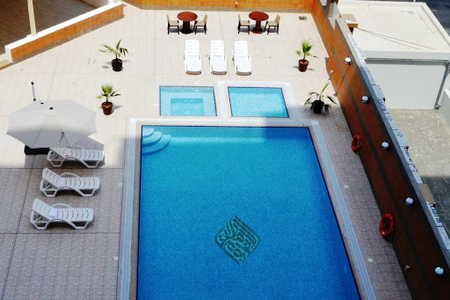 Pool side at Baghdad Street Serviced Apartments, Al Nahda 2