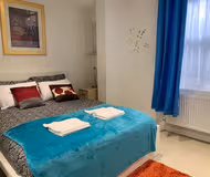 Bedroom at Hatter Suite